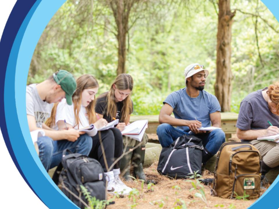 Students learning outdoors.