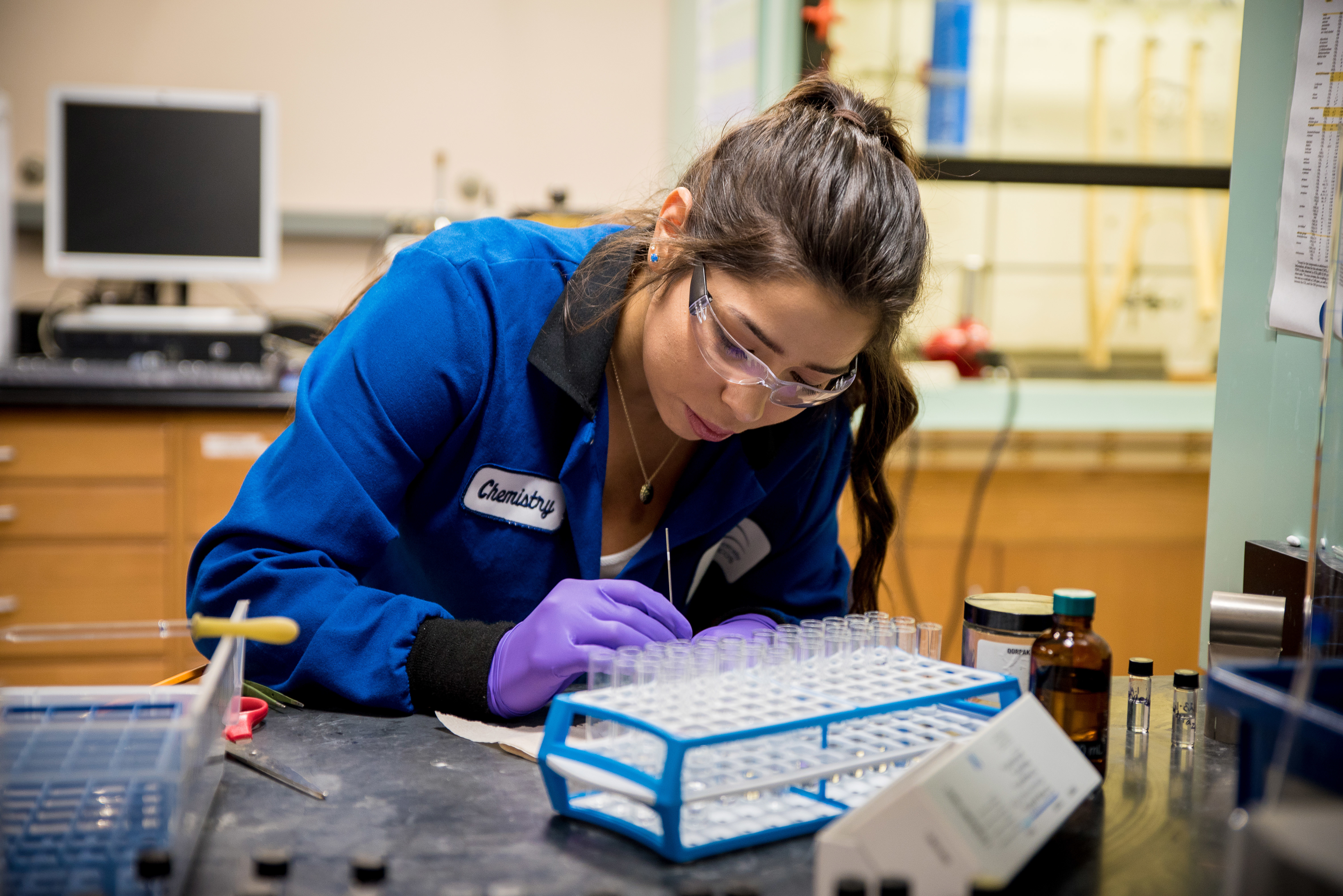CSUSM chemistry student working in the lab